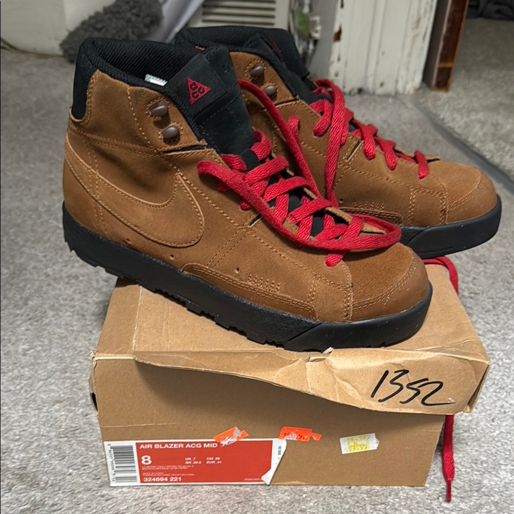 Nike Brown and Red Sneakers with Rugged Design